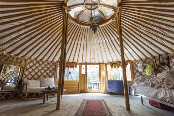 Off Grid Yurt Insides. With Kana (walls), Roof Poles, and Ridge Dome